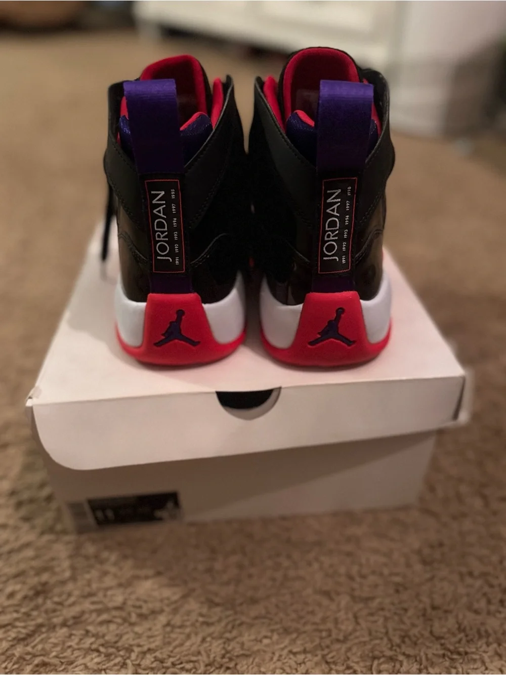 Jordan Men's Black/Red High-Top Sneakers with Purple Heel Tab